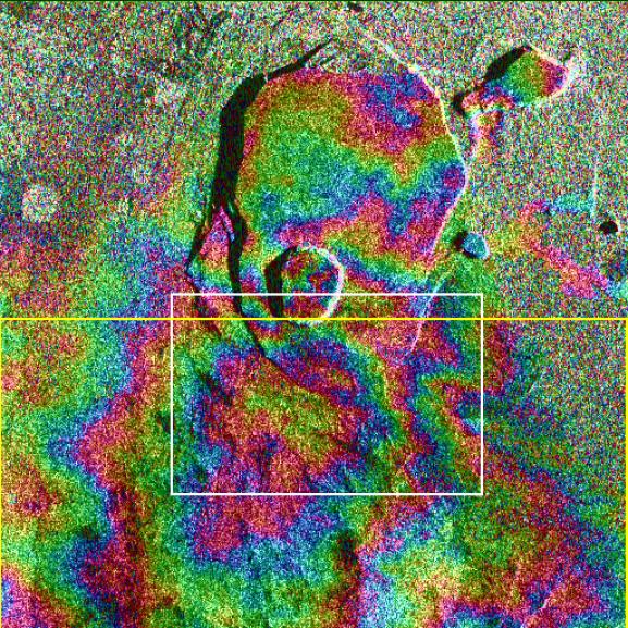 Grayscale radar image with multicolored overlay.