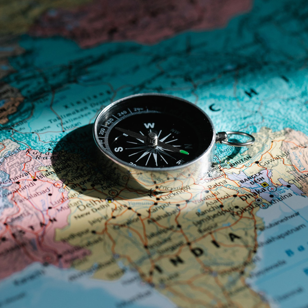 A stylized image of a map and compass.